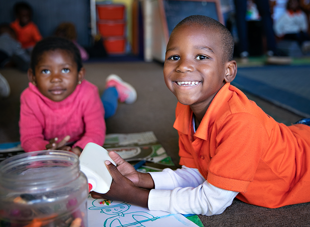Two young children playing with educational toys at a Cotlands early-learning centre
